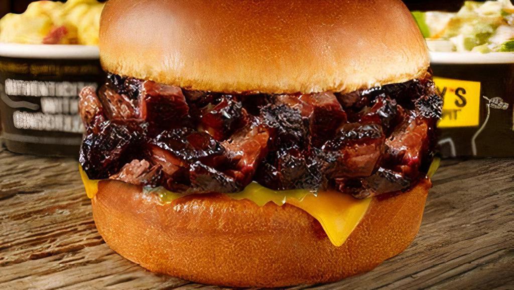 Brisket Burnt Ends Sandwich Plate · Chopped burnt ends of brisket with cheese & pickles on at toasted brioche bun, served with 2 sides.