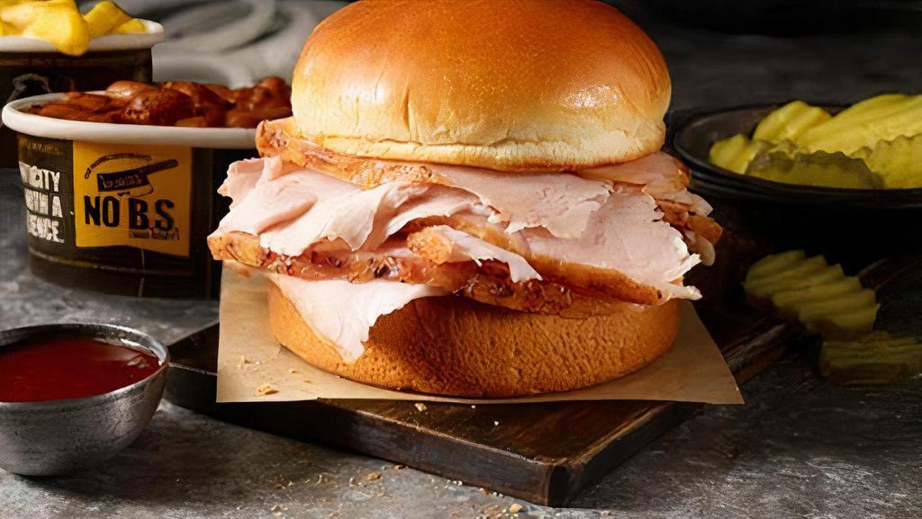 Turkey Classic Sandwich Plate · Order your favorite smokin' turkey sandwich, served with 2 sides today!
