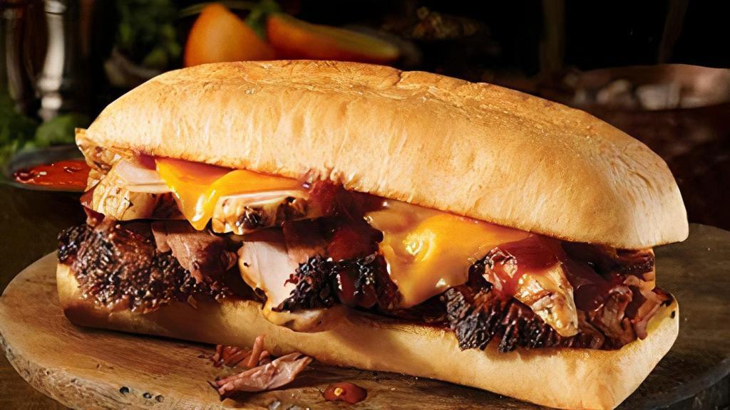 Westerner Sandwich · Texas sized sandwich, with your choice of two slow-smoked meats and cheddar cheese on a toasted hoagie bun.