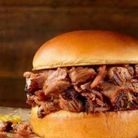Brisket Classic Sandwich · Includes a choice of chopped or sliced delicious slow-smoked brisket on a Brioche bun