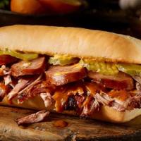 Cueban Sandwich · Citrus Pulled Pork, Jalapeno Cheddar Kielbasa with mustard & pickles on a toasted hoagie.