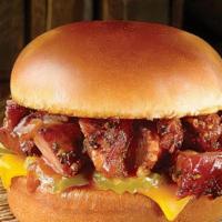 Pork Burnt Ends Sandwich · Double smoked chopped pork burnt ends of brisket with cheese & pickles, served on at toasted...