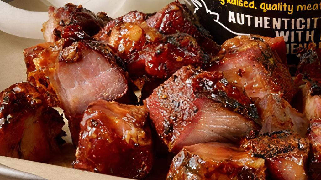 Pork Burnt Ends · Double smoked pork, tossed in our sweet barbecue sauce