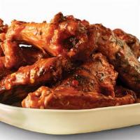 12 Piece Wings · 12 pieces of Pit Smoked Wings with choice of flavor.