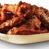 9 Piece Wings · 9 pieces of Pit Smoked Wings with choice of flavor.