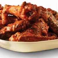 6 Piece Wings · 6 pieces of Pit Smoked Wings with choice of flavor.