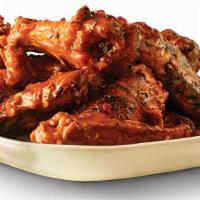 24 Piece Wings · 24 pieces of Pit Smoked Wings with choice of flavor.