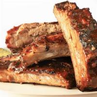 9 Piece Ribs · 9 pieces of Fall off the Bone Ribs with choice of flavor.