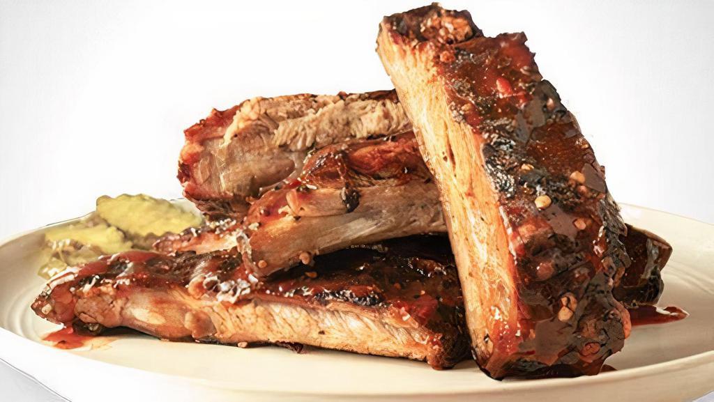 9 Piece Ribs · 9 pieces of Fall off the Bone Ribs with choice of flavor.