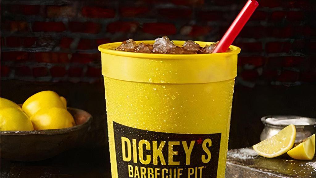 Big Yellow Cup · Fill up your Big Yellow Cup with Miss Ollie Dickey's famous iced tea or another drink of your choice