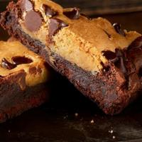 Blondie Brownie · Semi- sweet chocolate chips blended into a buttery, cookie-style brownie