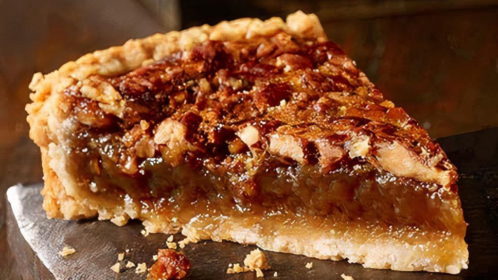 Pecan Pie Slice · A delicious combination of a buttery crisp pastry with a rich and chewy filling that is loaded with toasted pecans