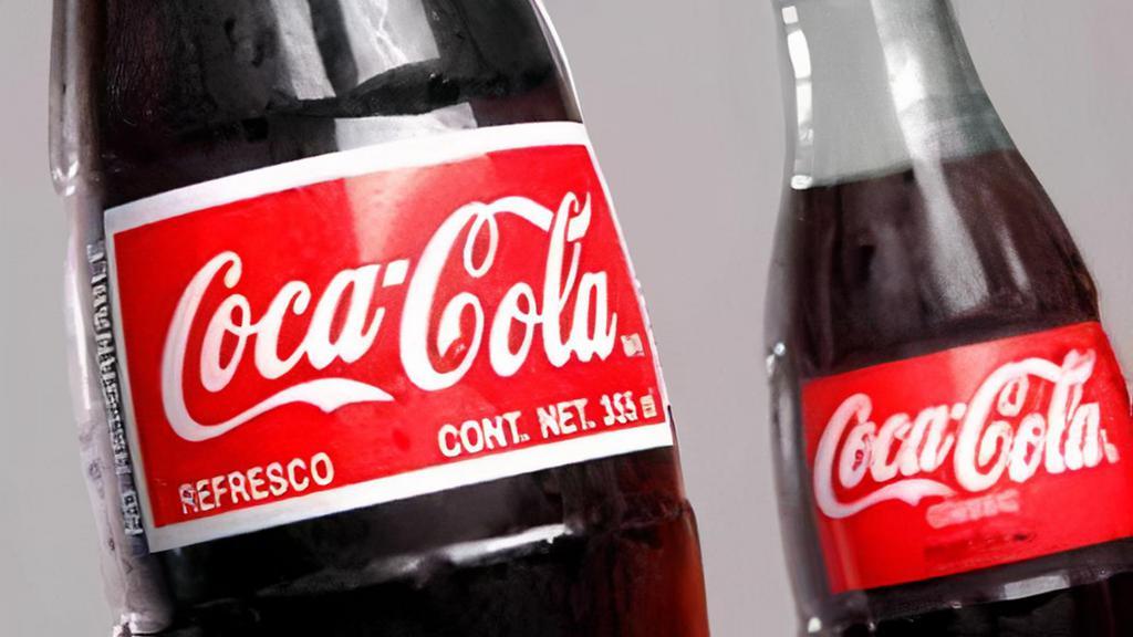 Cane Sugar Coca Cola · Bottle