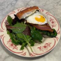 Fried Egg Sandwich · with Smoked Bacon, Braised Greens, Aioli & Cheddar on Focaccia  

Consuming raw or undercook...