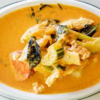 Panang Curry · Panang curry sauce, coconut milk, string beans, kaffir lime leaf, and pineapple. Spicy.
