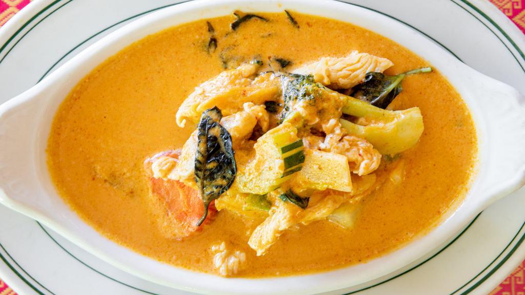 Panang Curry · Panang curry sauce, coconut milk, string beans, kaffir lime leaf, and pineapple. Spicy.