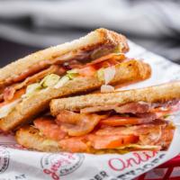 BLT Sandwich · Bacon, Lettuce, Tomato, and Mayo between Griddled Buttermilk Bread