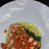 Grilled King Salmon · Grilled Ora King Salmon, Creamy Whipped Potatoes, Calabrian Pepper Relish, Sautéed Spinach