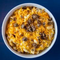 Cheeseburger Mac & Cheese Party-Sized · House-blended browned ground beef mix, sautéed onions atop our Classic Mac & Cheese.