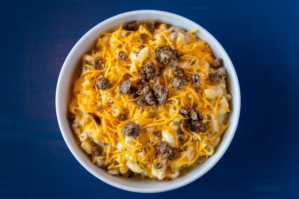 Cheeseburger Mac & Cheese · House-blended browned ground beef mix, sautéed onions atop our Classic Mac & Cheese.