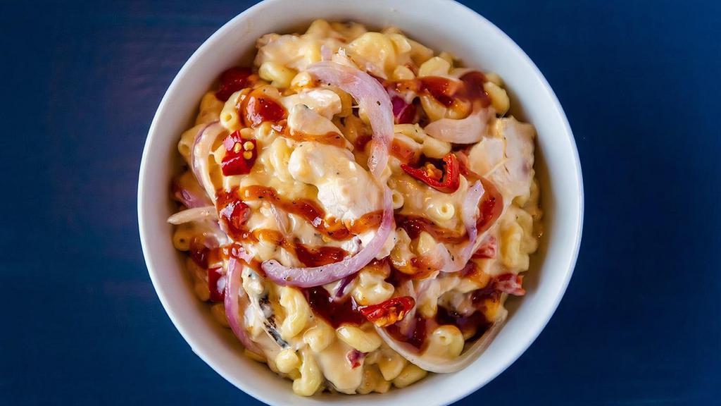 Bbq Mac & Cheese · Grilled Chicken, cheddar, red onions, sweet tangy house-made BBQ glaze, calabrian peppers on top of our Classic Mac and Cheese.