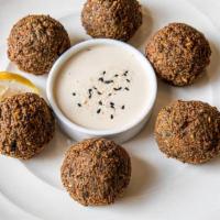 Falafel · 6 handmade to order pieces of Falafel. Made from ground chickpeas, fresh herbs, and spices. ...