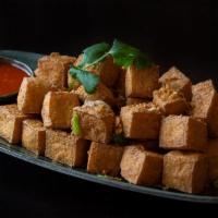 Fried Tofu · Gluten free. Deep fried soft tofu served with a sweet and sour chili sauce.