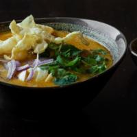 Ohn-No Khao Swe · Coconut noodle soup. A rich and creamy bisque with flour noodles. Served with chicken, onion...