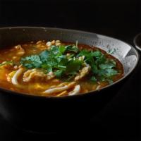 Moh Hin Gha · Pureed catfish chowder. Pureed catfish bisque with lemongrass, ginger, garlic, onions, cilan...