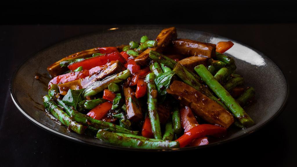 Tofu and Vegetables · Stir-fried tofu with string beans bell peppers garlic ginger basil soy sauce and vegetarian hoisin sauce.
