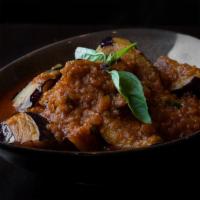 Burmese Eggplant Curry · Gluten free. Onion based curry with eggplant, ginger, garlic, paprika, turmeric, tamarind an...
