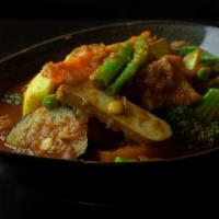 Mixed Vegetables Curry · Gluten free. Onion based curry with eggplant, tomatoes, string beans, cabbage, broccoli, opo...