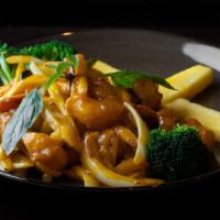 Mango Shrimp · Marinated shrimp tossed in a wok with soy sauce, black pepper, basil, onions, sambal chili a...