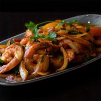 Shrimp Kebat · Gluten free. Marinated shrimp stir-fried with onions, tomatoes, mint, cilantro, jalapeños, t...