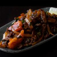 Beef Kebat · Gluten free. Marinated tri tip stir-fried with onions, tomatoes, mint, cilantro, jalapeños, ...