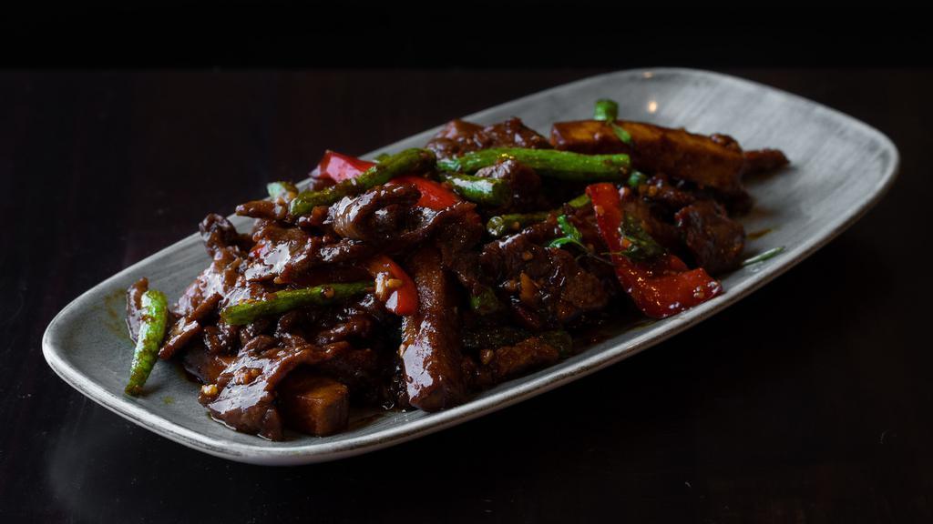 Beef Tofu · Tri tip wok-fried with tofu, string beans, bell peppers, garlic, ginger, basil with hoisin and oyster sauce.