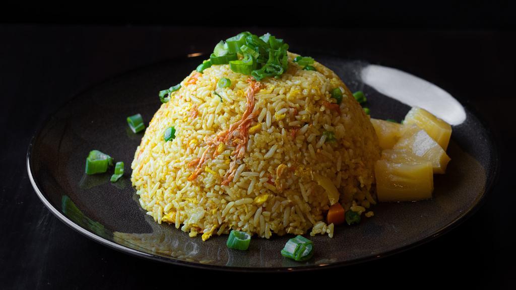 Pineapple Fried Rice · Gluten free. Choice of jasmine or brown rice with pineapple, green beans, carrots, egg, onions, scallions, soy sauce and turmeric.