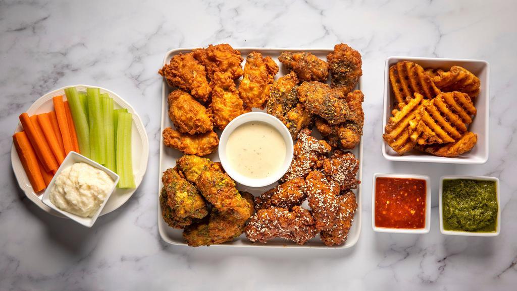 20 Boneless Wings Combo · With your choice of 4 flavors and 4 dips. Comes with 2 sides and veggie sticks.