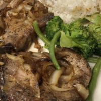 Pan Roasted Pork Chops · 2 pieces. Pan-roasted pork chops with sauteed onion and choice of rice or thyme roasted pota...