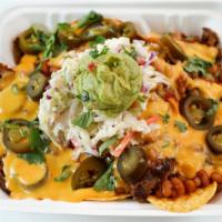 Fully Loaded Mob Nachos · Barbecue seasoned tortilla chips topped with smoked plant-based brisket, nacho cheese, mob s...