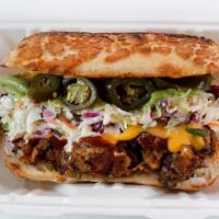 Da Divisadero aka Not - Yo - Cheesesteak · Plant-based brisket with grilled onions and colorful bell peppers on a soft roll with melted...