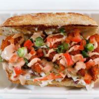 Shrimp Po’ Boy · BBQ fried shrimp made on a toasted roll and topped with Tasha's slaw, diced tomatoes, and ou...