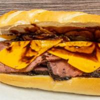 9. The BBQ Beef · Hot roast beef, bacon, BBQ sauce, Cheddar cheese on roll.
