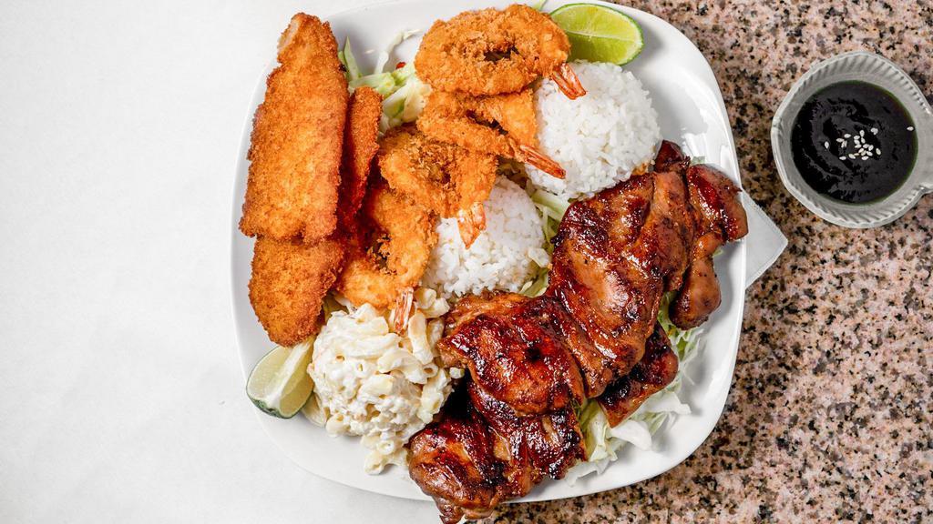 Hawaiian Seafood Combo · Freshly fried shrimp, white pollock fish katsu, and your choice of one bbq item – beef, chicken, or ribs. Served with steam rice, fried rice, and macaroni salad.