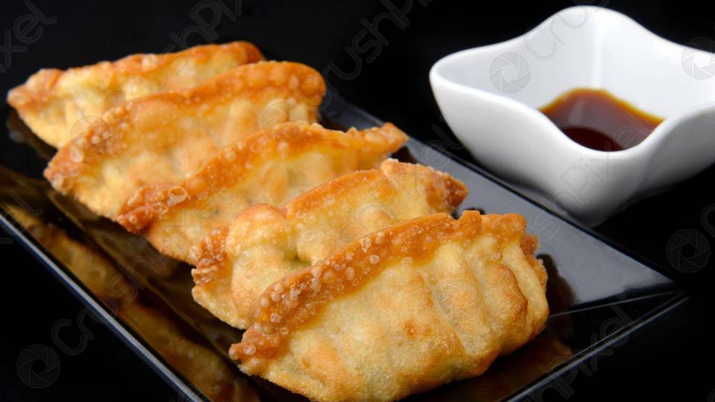 Fried Gyozas (6) · Enjoy this delicious dumplings that filled with ground pork and vegetables.