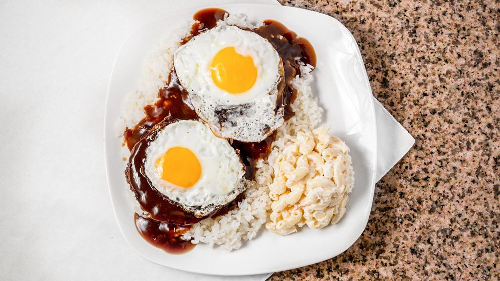 Beef Loco Moco · Starts with a bed of sticky white rice and is topped with, a two hamburger patty, two sunny-side-up egg, and brown gravy.