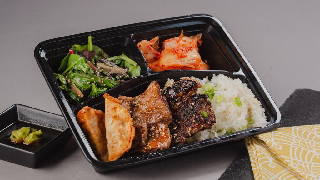 The Beef Combo Bento Box · A bento box with your choice of 2 beef styles and your choice of either white rice or chow mein noodles with 2 sides.