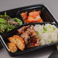 Sesame Beef Bento Box · A bento box with sesame beef and your choice of either white rice or chow mein noodles with ...