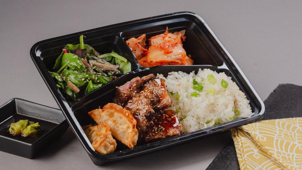 Sesame Beef Bento Box · A bento box with sesame beef and your choice of either white rice or chow mein noodles with 2 sides.