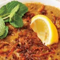 Goat Haleem · A traditional slow cooked lentil, wheat, barley with lightly spiced goat meat and gravy